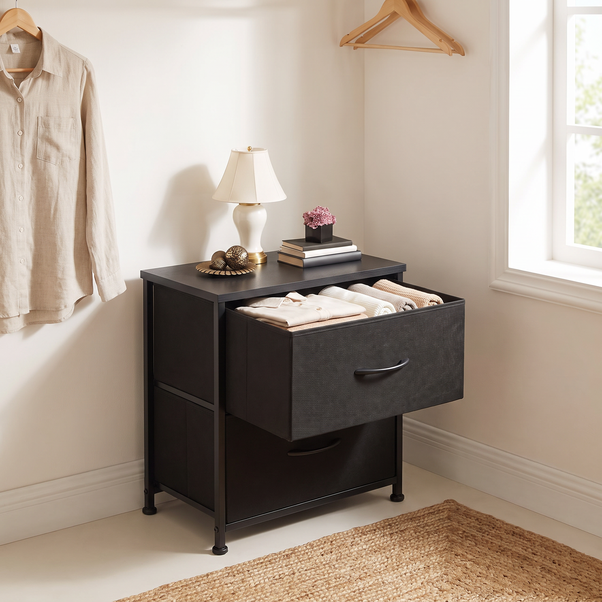 Halden nightstand with a fabric bin pulled out holding textiles