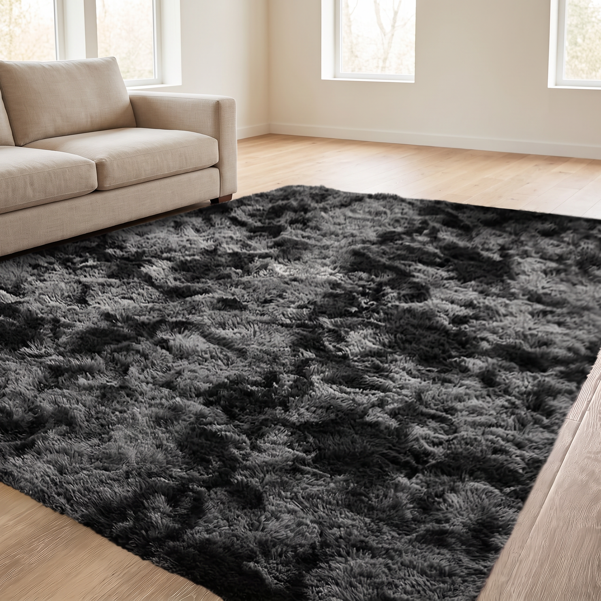 Sable rug across light oak flooring in an open living space