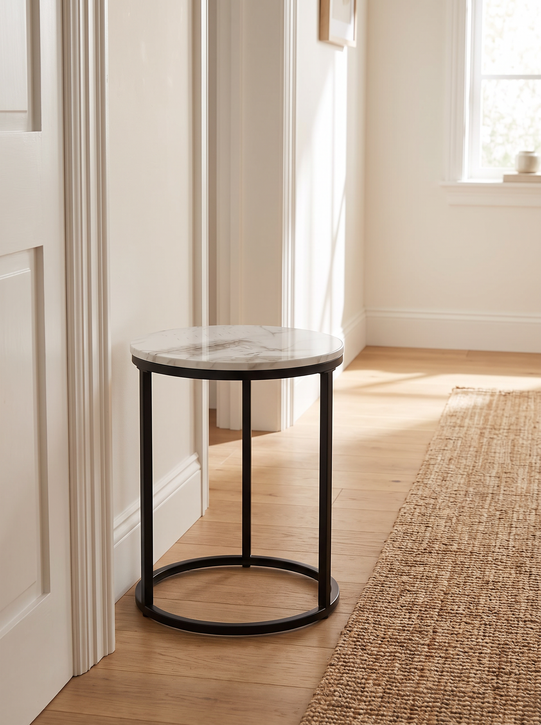 Marlowe nesting table rounded edge in a walkway